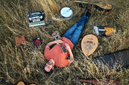 Geoff Zanelli with various instruments