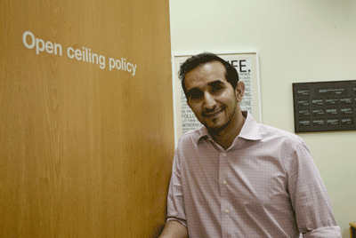 Artin Nazarian, Director Disney Digital Studio Digital Distribution Services at the door of his office which has no ceiling, inviting all to drop in at any time.